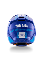 Kask Alpinestars Yamaha S-M3, kask motocrossowy, niebiesko-biały z połyskiem, widok z tyłu pokazujący białe logo YAMAHA i niebieski napis Alpinestars, błyszczące wykończenie z widocznymi otworami wentylacyjnymi i etykietami certyfikacji bezpieczeństwa