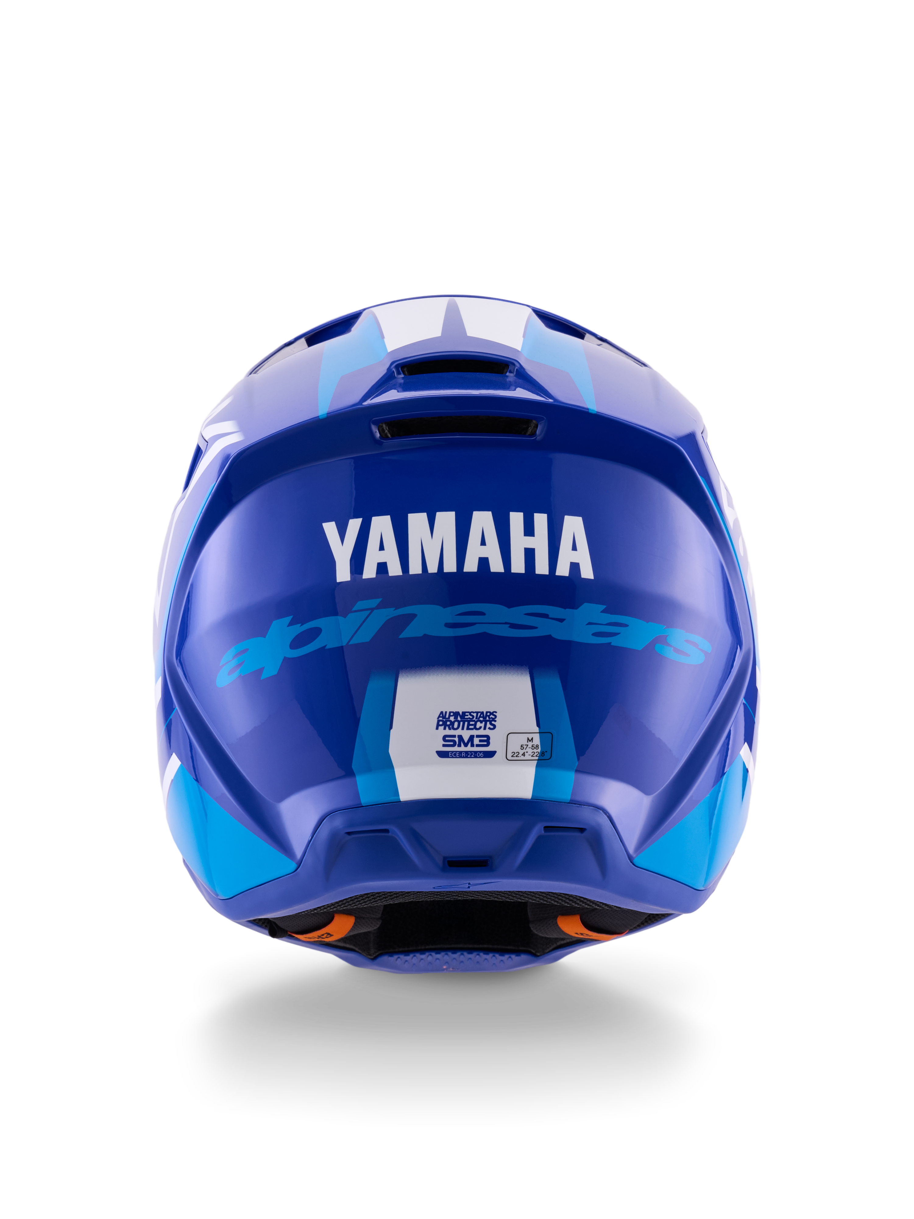 Kask Alpinestars Yamaha S-M3, kask motocrossowy, niebiesko-biały z połyskiem, widok z tyłu pokazujący białe logo YAMAHA i niebieski napis Alpinestars, błyszczące wykończenie z widocznymi otworami wentylacyjnymi i etykietami certyfikacji bezpieczeństwa