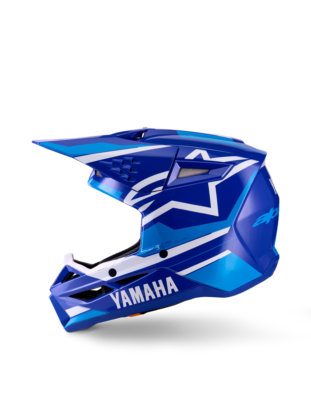 Młodzieżowy kask motocrossowy Yamaha S-M3, kask motocrossowy, niebiesko-biały błyszczący, widok z boku, wyraźne logo Yamaha na osłonie podbródka i logo gwiazdy Alpinestars, smukła aerodynamiczna skorupa z licznymi otworami wentylacyjnymi i zintegrowanym daszkiem