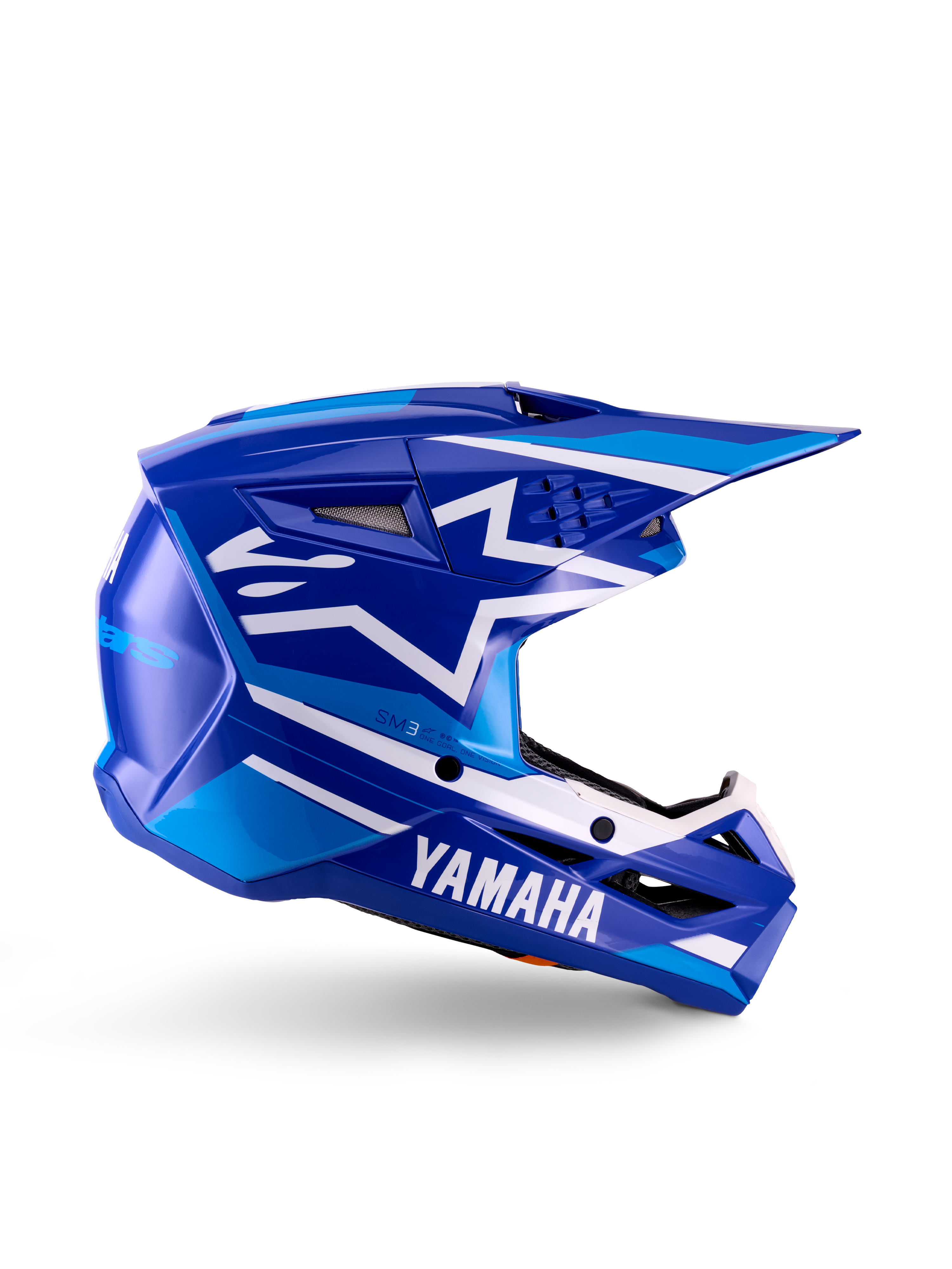Młodzieżowy kask motocrossowy Yamaha S-M3, niebiesko-biały błyszczący, widok z boku z wyraźnym brandingiem Yamaha i logo gwiazdy Alpinestars, geometryczny wzór z jasnoniebieskimi akcentami, wentylowana skorupa z długim daszkiem, ochrona głowy off-road z certyfikatem ECE 22.06