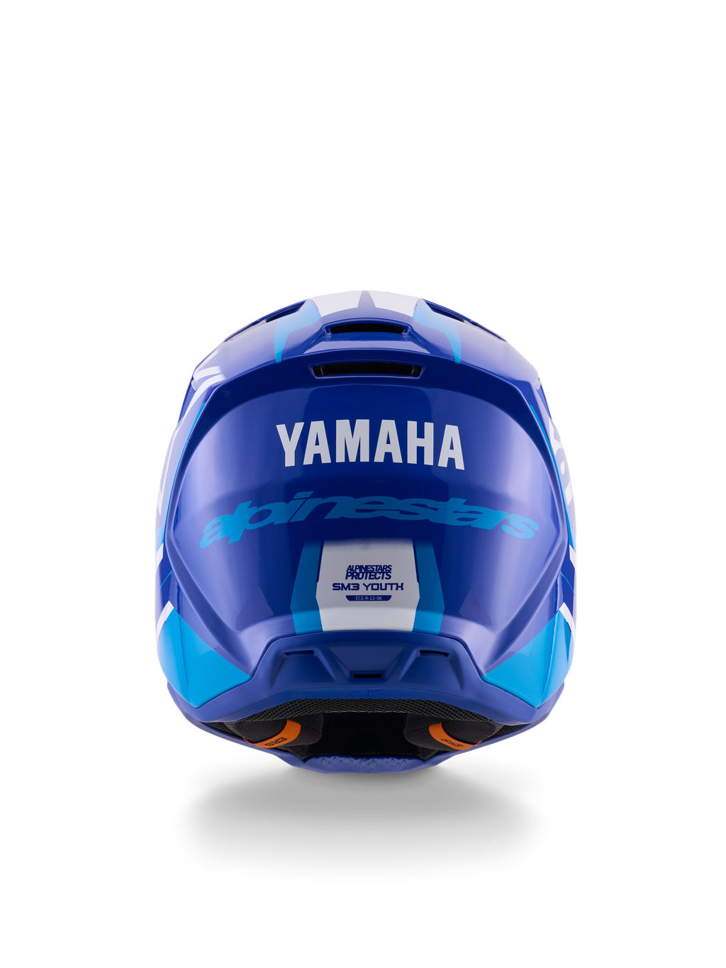 Kask motocrossowy młodzieżowy Yamaha S-M3, widok z tyłu, niebiesko-biały z połyskiem, wyraźne logo Yamaha i Alpinestars, aerodynamiczna konstrukcja skorupy, certyfikat bezpieczeństwa ECE 22.06, profesjonalna ochrona głowy do wyścigów off-road