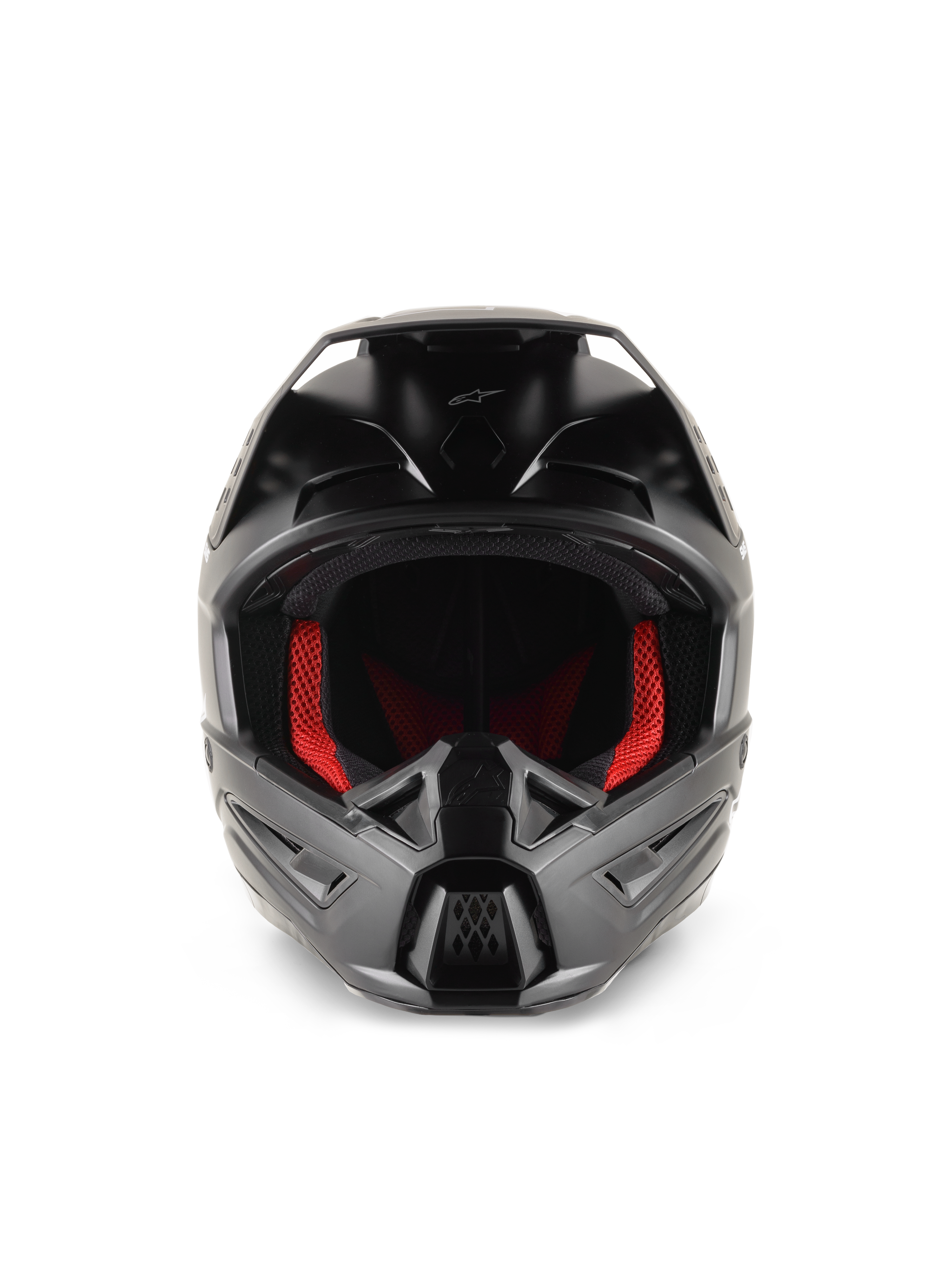 Kask Alpinestars S-M5 Solid, kask motocrossowy, czarny mat, widok z przodu z czerwoną wyściółką wewnętrzną, wyprofilowaną częścią szczękową z otworami wentylacyjnymi i daszkiem ochronnym do wyścigów off-road