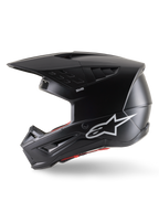 Alpinestars S-M5 Solid Helmet ECE 22.06, kask motocrossowy, czarny mat, widok z profilu, eleganckie matowe wykończenie, białe logo Alpinestars z boku, czerwona wyściółka wewnętrzna, aerodynamiczna skorupa ze zintegrowanymi otworami wentylacyjnymi