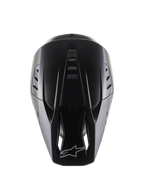 Alpinestars S-M5 Solid Helmet ECE 22.06, kask motocrossowy, czarny mat, widok z góry pokazujący aerodynamiczną skorupę z żebrowaniem wentylacyjnym, daszek z wlotami powietrza i logo Alpinestars, gładkie matowe wykończenie zaprojektowane do wyścigów terenowych
