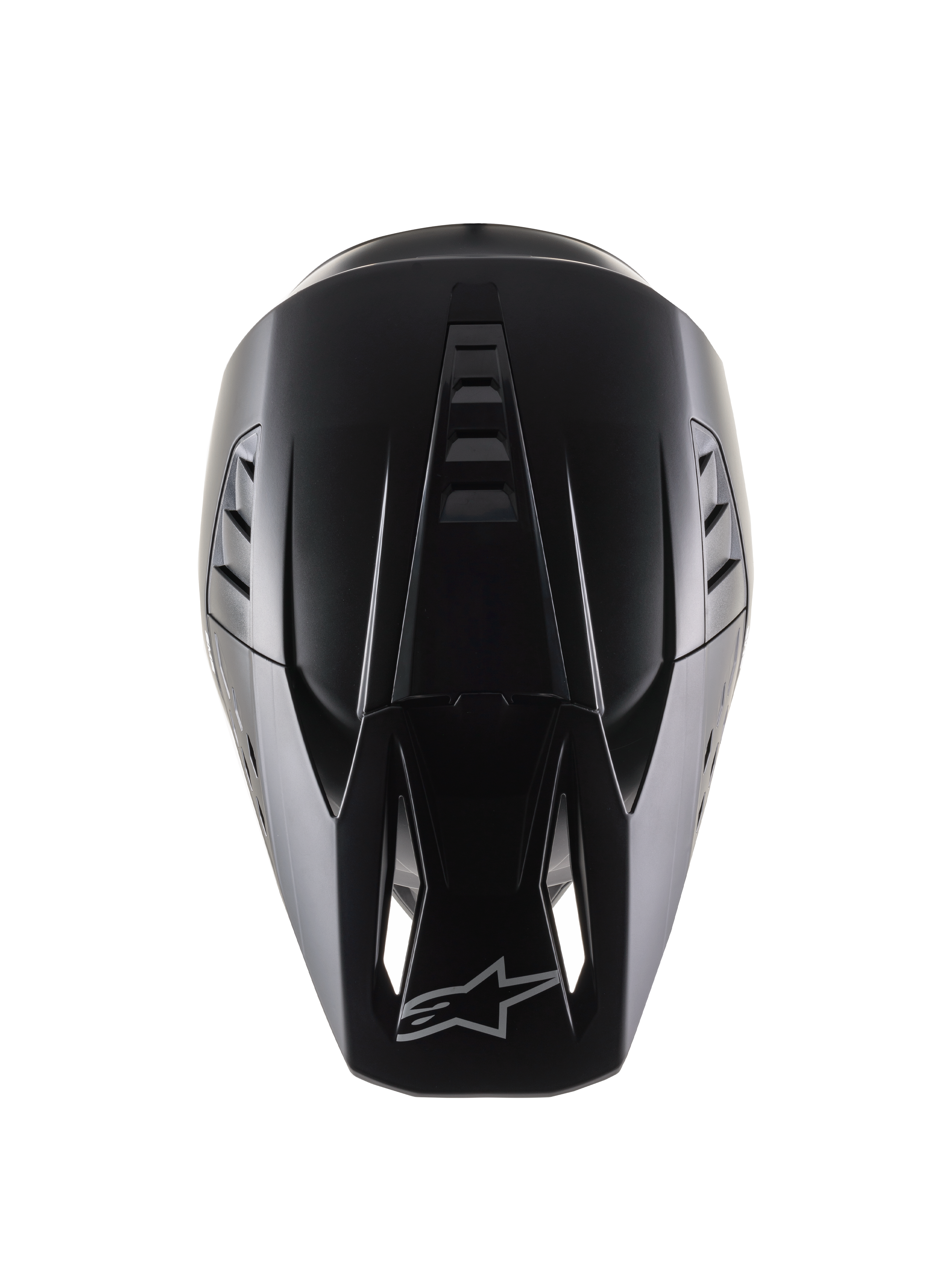 Alpinestars S-M5 Solid Helmet ECE 22.06, kask motocrossowy, czarny mat, widok z góry pokazujący aerodynamiczną skorupę z żebrowaniem wentylacyjnym, daszek z wlotami powietrza i logo Alpinestars, gładkie matowe wykończenie zaprojektowane do wyścigów terenowych