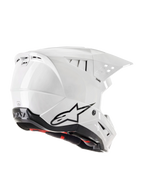 Kask Alpinestars S-M5 Solid ECE 22.06, kask motocrossowy, biały błyszczący, widok z tyłu z boku z czarnym logo Astars, zintegrowane otwory wentylacyjne i smukła aerodynamiczna konstrukcja skorupy