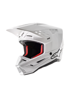 Alpinestars S-M5 Solid Helmet ECE 22.06, kask motocrossowy, biały z połyskiem, z czerwoną wyściółką, czarnym logo Alpinestars, aerodynamicznym daszkiem i licznymi otworami wentylacyjnymi dla ochrony w wyścigach off-road
