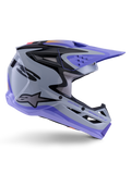 Alpinestars S-M3 Jettson Helmet ECE 22.06, kask motocrossowy, szaro-fioletowo-czarny błyszczący, widok z boku prezentujący fioletowy daszek i osłonę szczęki, smukła aerodynamiczna skorupa z czarną grafiką, liczne otwory wentylacyjne i logo „Jettson Donuts” z boku