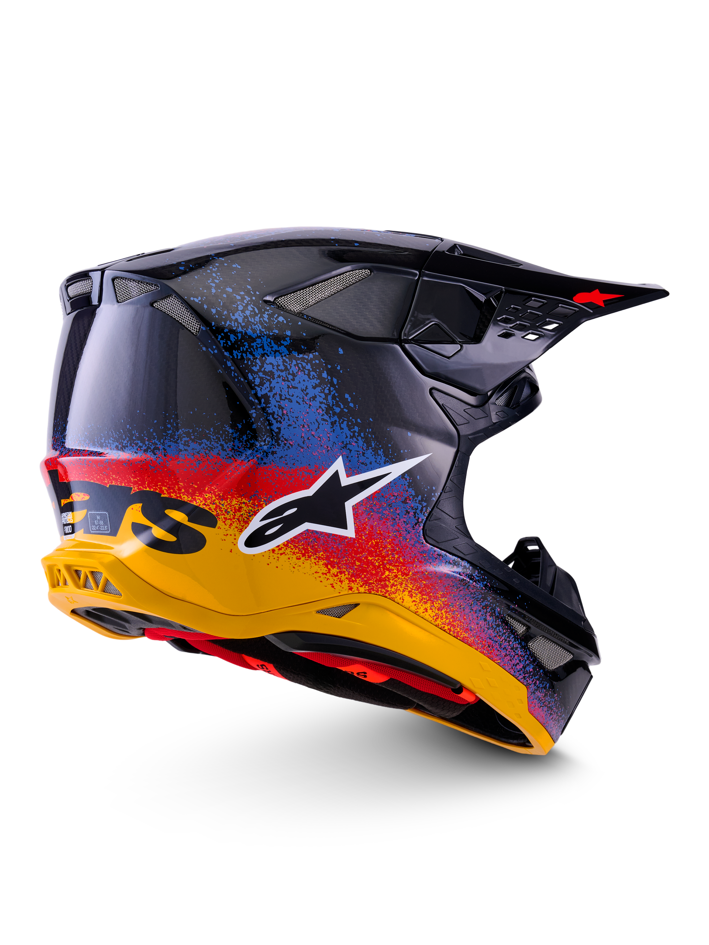 Alpinestars Limited Edition Supertech M10 Black Hole Helmet, kask motocrossowy, kolor Black Burst Glossy z jaskrawym nakrapianym gradientem przechodzącym od żółtego przez czerwony do niebieskiego, lekka skorupa z włókna węglowego z białym logo A-star i zintegrowanymi siatkowymi otworami wentylacyjnymi
