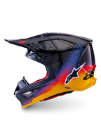 Alpinestars Limited Edition Supertech M10 Black Hole Helmet, kask motocrossowy, błyszczące wykończenie Black Burst z jaskrawym niebieskim, czerwonym i żółtym gradientowym wzorem typu splatter, widok z profilu ukazujący białe logo Astars i teksturę włókna węglowego