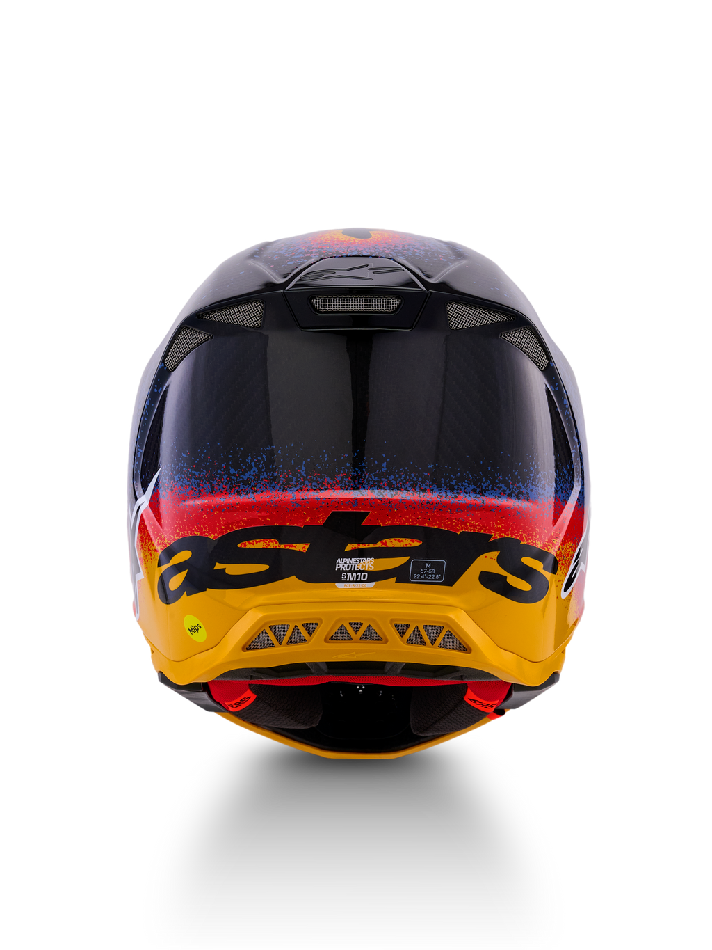 Kask Alpinestars Limited Edition Supertech M10 Black Hole, kask motocrossowy, widok z tyłu, błyszczące wykończenie Black Burst z niebiesko-czerwonymi nakropieniami przechodzącymi w jaskrawożółtą podstawę, czarny branding „astars”, widoczne otwory wylotowe zapewniające optymalny przepływ powietrza.