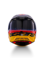 Kask Alpinestars Limited Edition Supertech M10 Black Hole, kask motocrossowy, widok z tyłu, błyszczące wykończenie Black Burst z niebiesko-czerwonymi nakropieniami przechodzącymi w jaskrawożółtą podstawę, czarny branding „astars”, widoczne otwory wylotowe zapewniające optymalny przepływ powietrza.