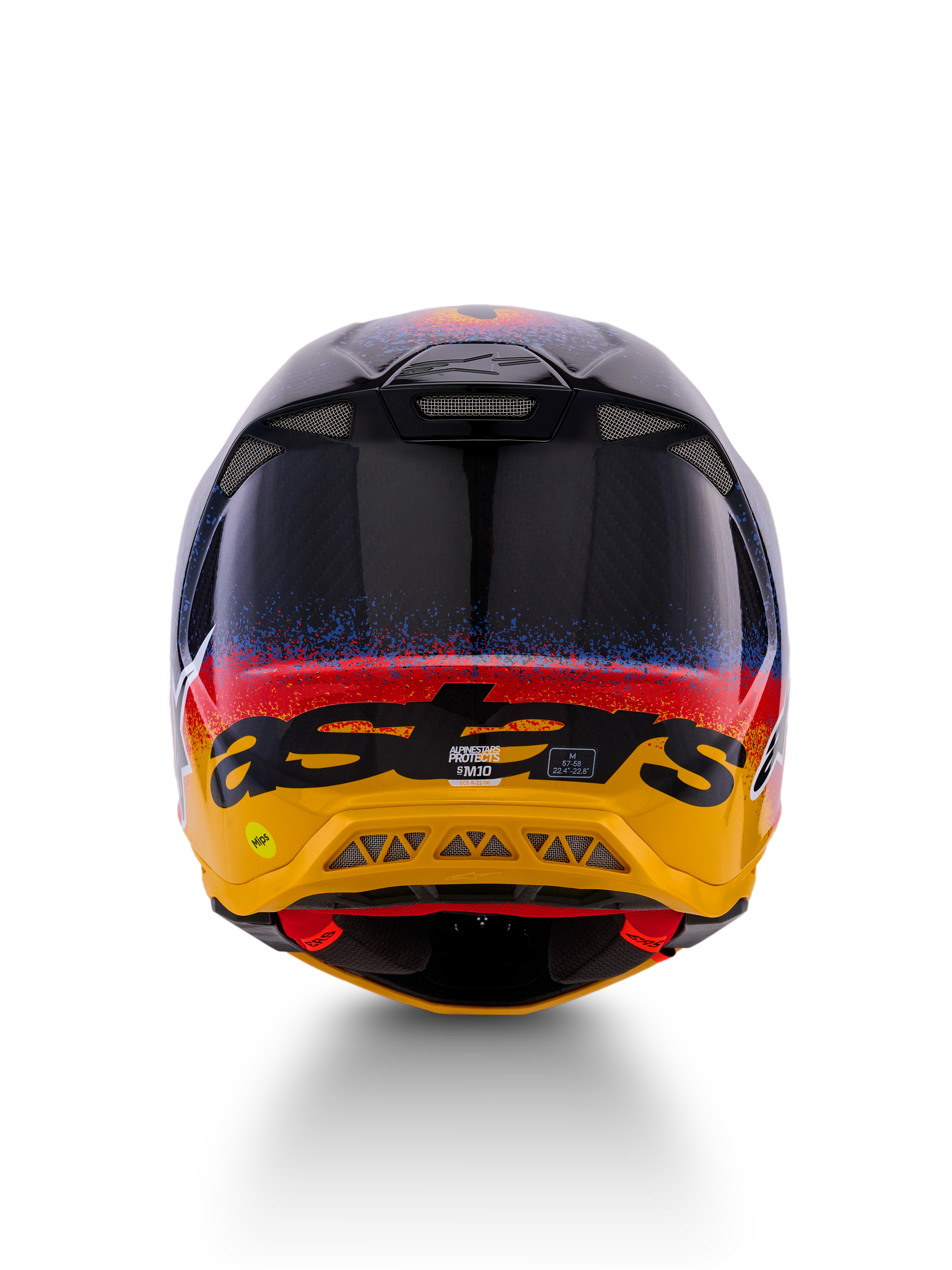 Kask Alpinestars Limited Edition Supertech M10 Black Hole, kask motocrossowy, widok z tyłu, błyszczące wykończenie Black Burst z niebiesko-czerwonymi nakropieniami przechodzącymi w jaskrawożółtą podstawę, czarny branding „astars”, widoczne otwory wylotowe zapewniające optymalny przepływ powietrza.