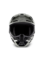 Kask Alpinestars Limited Edition S-M7 Wolf Dust, kask motocrossowy, kolor Dune Black Glossy z biało-czarną grafiką, widok z przodu ukazujący szeroki otwór na gogle i liczne wloty wentylacyjne, aerodynamiczny daszek z logo Alpinestars i napisem „One Goal One Vision”, specjalistyczna ochrona głowy do wyścigów off-road