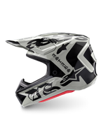 Kask Alpinestars Limited Edition S-M7 Wolf Dust, kask motocrossowy, Dune Black Glossy, skorupa w odcieniu złamanej bieli z czarnym gotyckim brandingiem ASTARS i wzorami graficznymi, widoczna czerwona wyściółka wewnętrzna, aerodynamiczny profil do wyścigów off-road