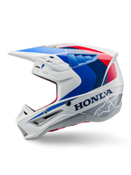 Kask Alpinestars Honda S-M5 ECE, biało-niebiesko-czerwony połysk, widok z boku, z wyraźnym brandingiem Honda i logo gwiazdy Alpinestars, aerodynamiczny design motocrossowy z licznymi otworami wentylacyjnymi i wyraźnym daszkiem, błyszczące wykończenie