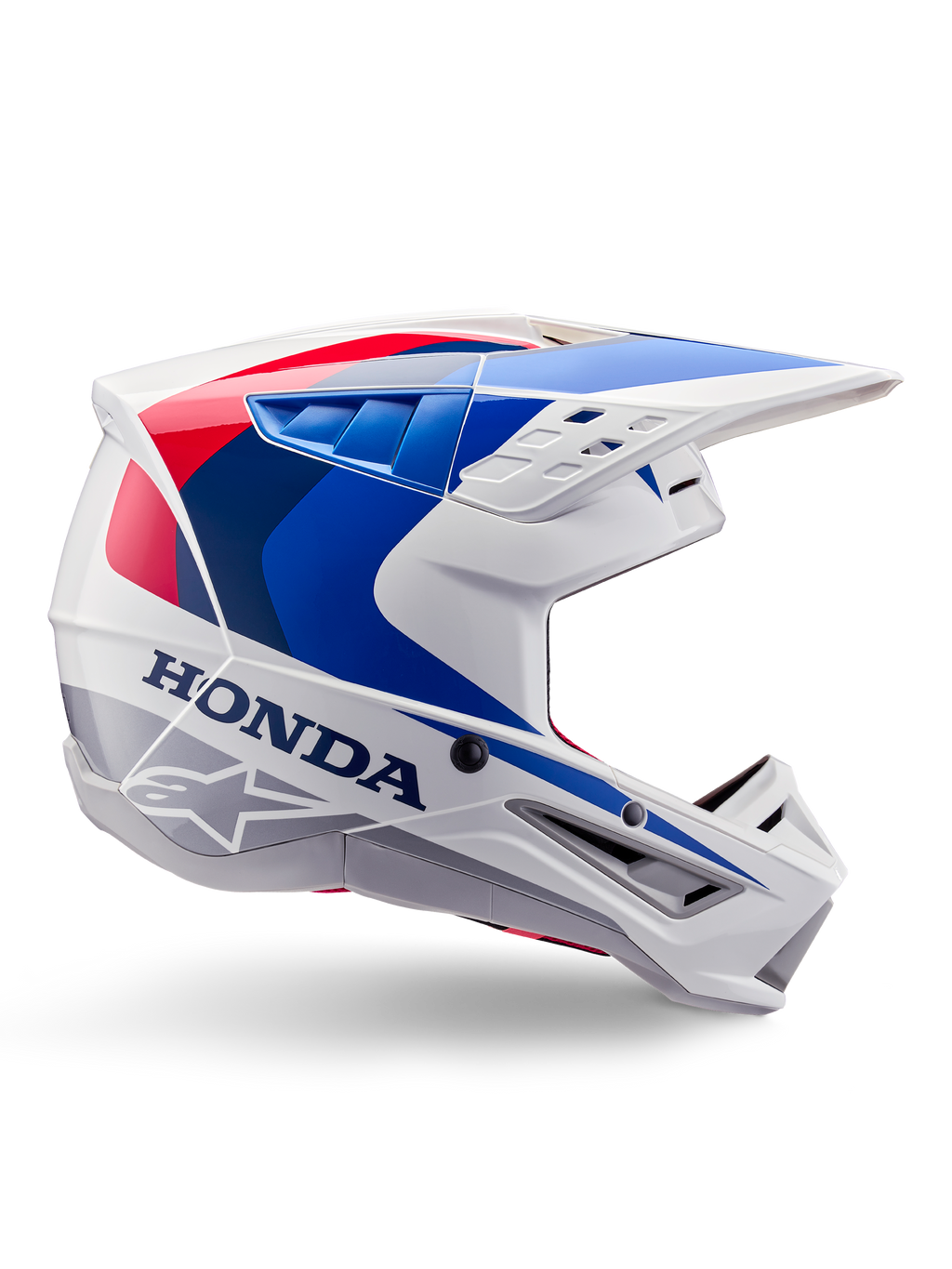 Kask Alpinestars Honda S-M5 Helmet ECE, kask motocrossowy, biały, niebieski i czerwony, widok z profilu, aerodynamiczny design ze zintegrowanym daszkiem, liczne otwory wentylacyjne, błyszczące wykończenie, wyraźne logo Honda i Alpinestars