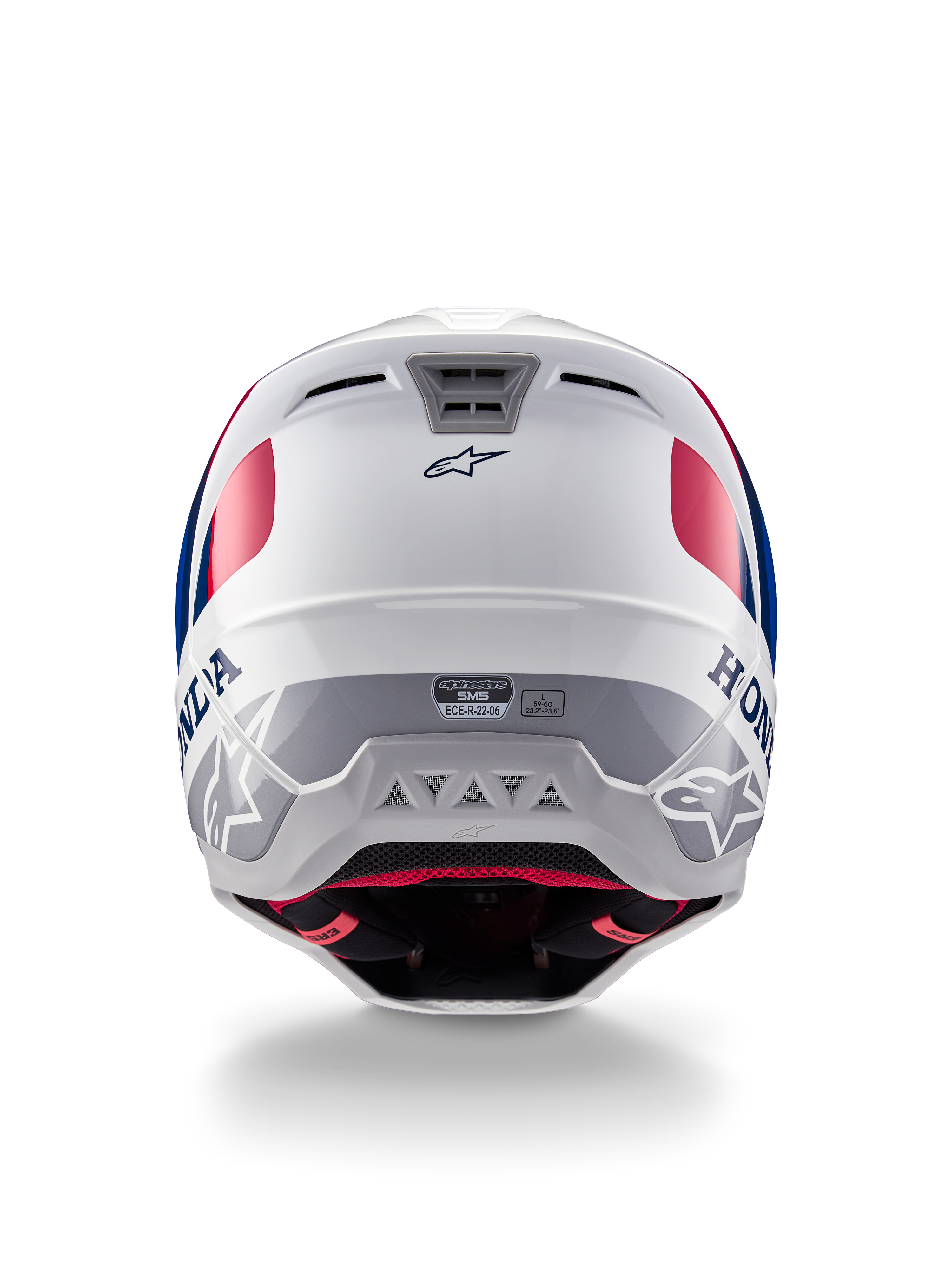 Kask Alpinestars Honda S-M5 ECE, kask motocrossowy, biało-niebiesko-czerwony z połyskiem, widok z tyłu ukazujący branding Honda i Alpinestars, aerodynamiczna skorupa ze zintegrowanymi wylotami wentylacyjnymi i etykietą certyfikacji ECE.