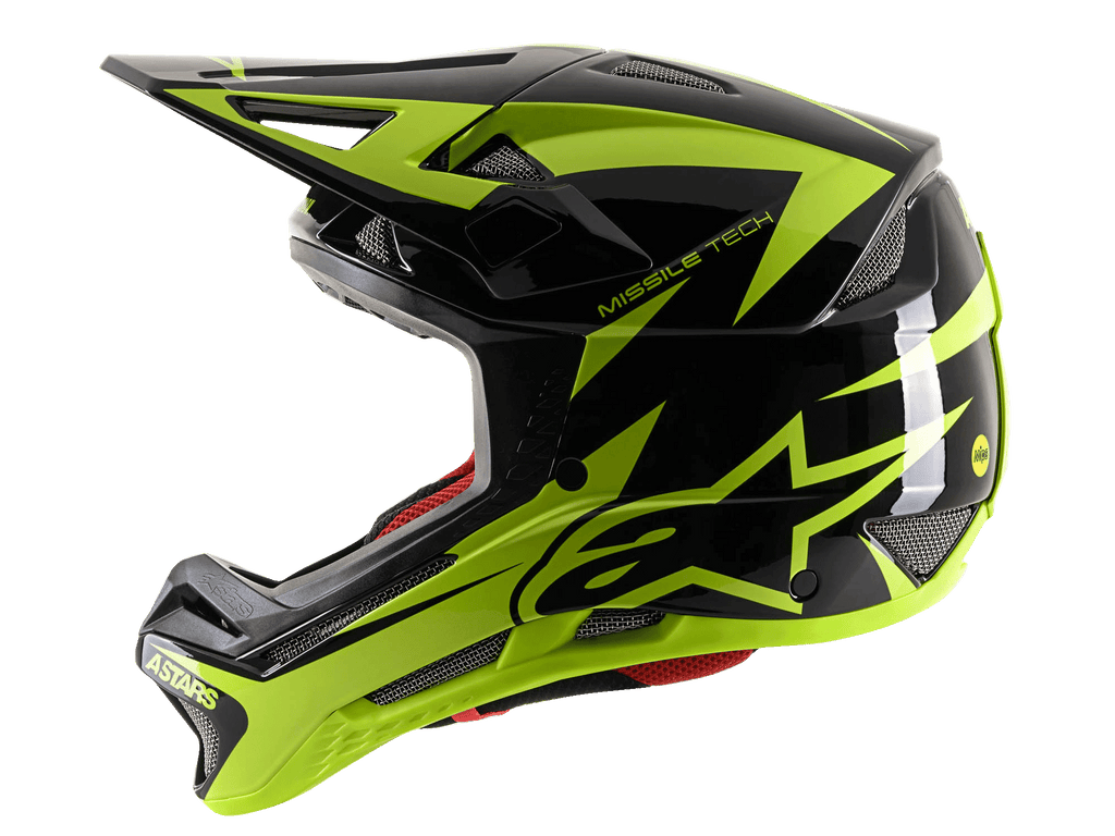 Alpinestars Missile Tech-Air Full Face Helmet, kask MTB full face, czarny i żółty fluo połysk, widok z boku podkreślający duże żółte logo gwiazdy, siatkowe otwory wentylacyjne i aerodynamiczny daszek do jazdy downhill.