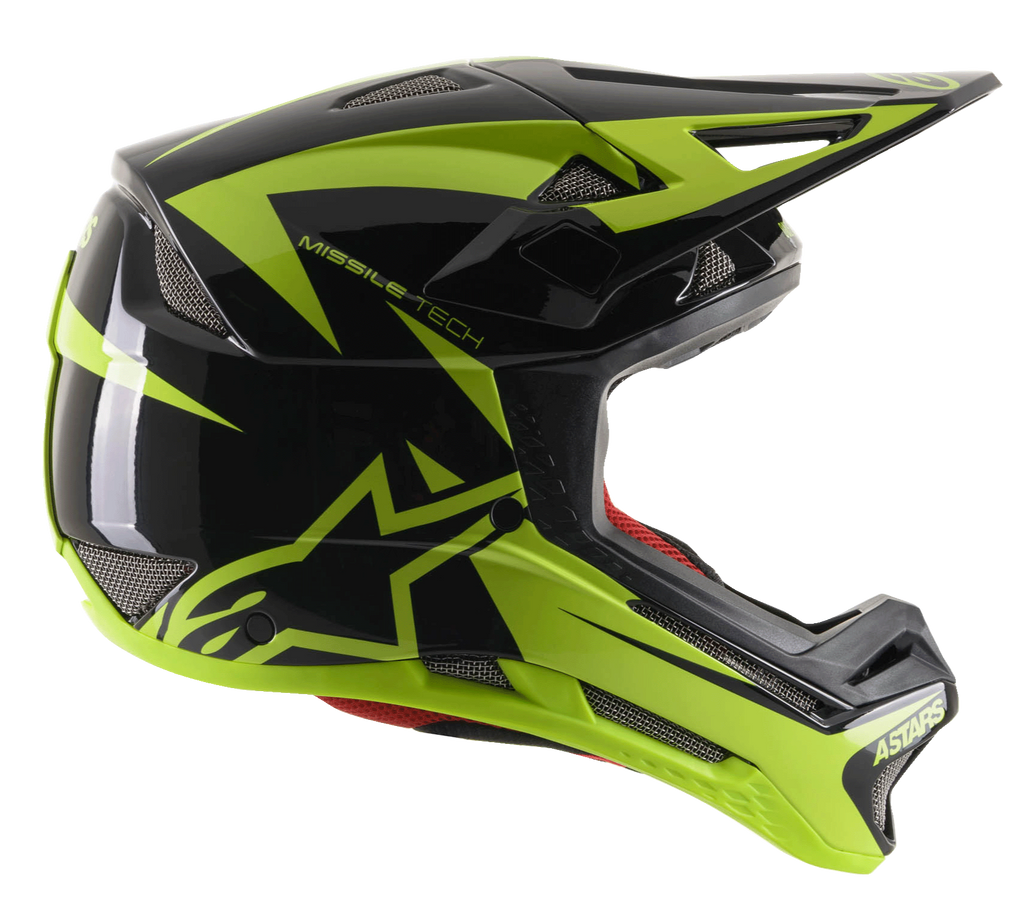 Kask Alpinestars Missile Tech-Air Full Face, kask MTB do downhillu, czarny i żółty fluo z połyskiem, widok z profilu z aerodynamicznymi siatkowymi otworami wentylacyjnymi, duże fluorescencyjne żółte logo gwiazdy i branding MISSILE TECH, czerwona wyściółka wewnętrzna, smukły wyczynowy design do kolarstwa górskiego