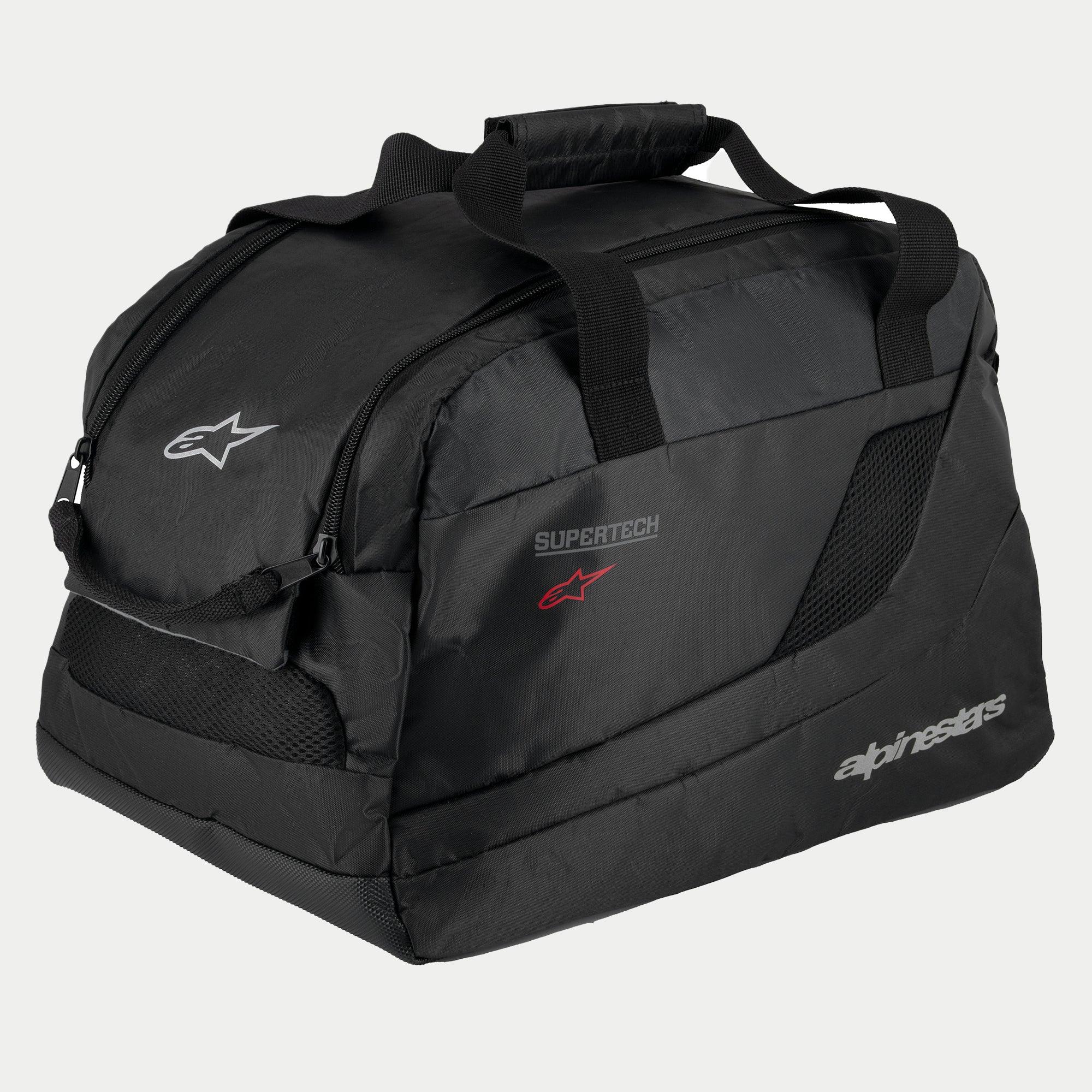 Torba na kask Alpinestars Supertech R10, czarna, wyściełana półsztywna konstrukcja na kaski motocyklowe, z uchwytami do przenoszenia zapinanymi na rzep, otwarciem na zamek błyskawiczny, siatkowymi panelami wentylacyjnymi oraz odblaskowymi logotypami Alpinestars i Supertech