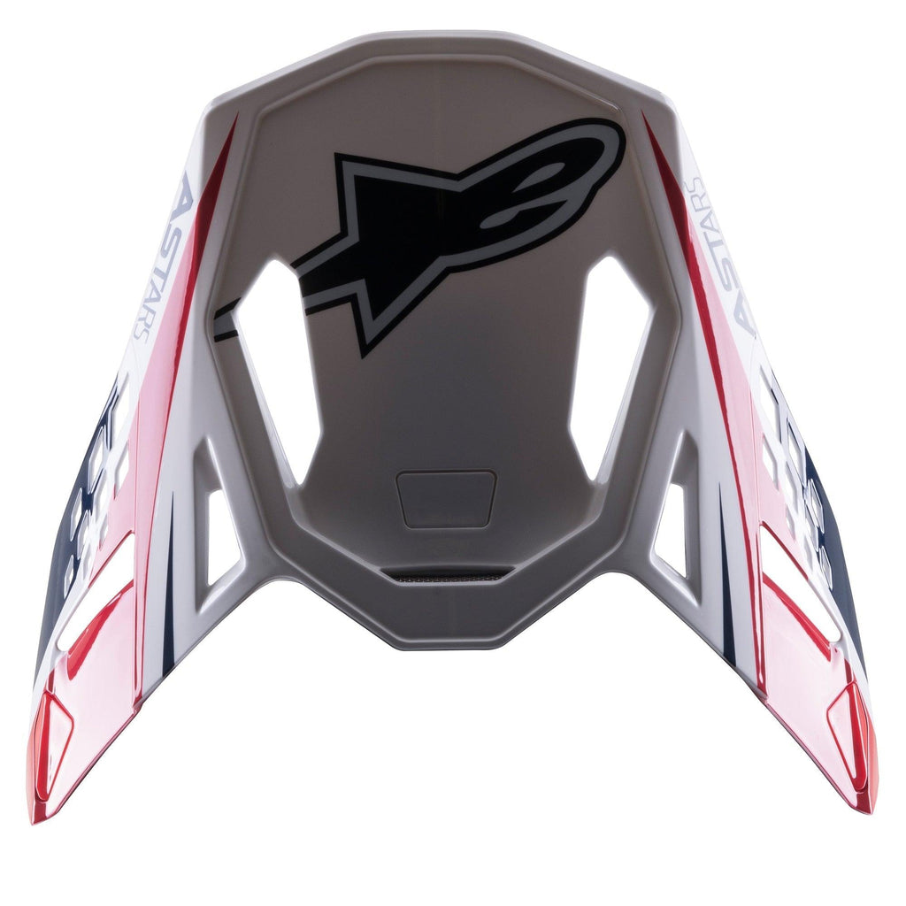 Alpinestars Supertech M10 Carbon Meta2 Visor, wymienny daszek do kasku, biały, czerwony i niebieski z błyszczącym wykończeniem, z czarnym logo Astars i dynamiczną grafiką, zaprojektowany do kasków motocrossowych off-road