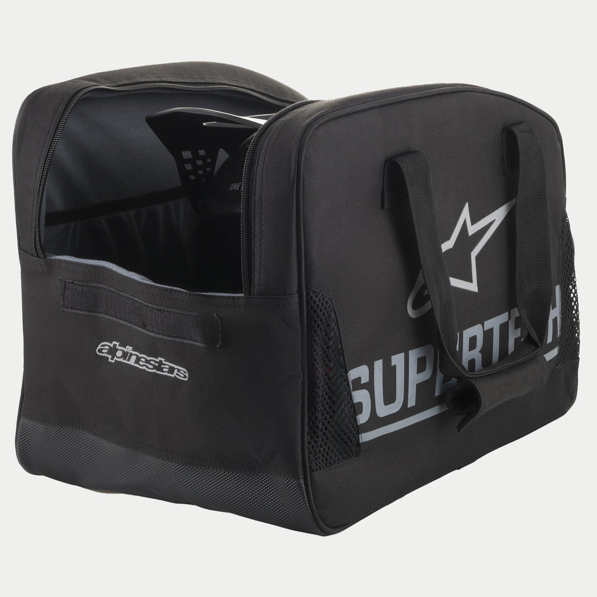 Alpinestars Supertech, czarna półsztywna torba na kask motocrossowy ze srebrnym brandingiem i wytrzymałymi uchwytami