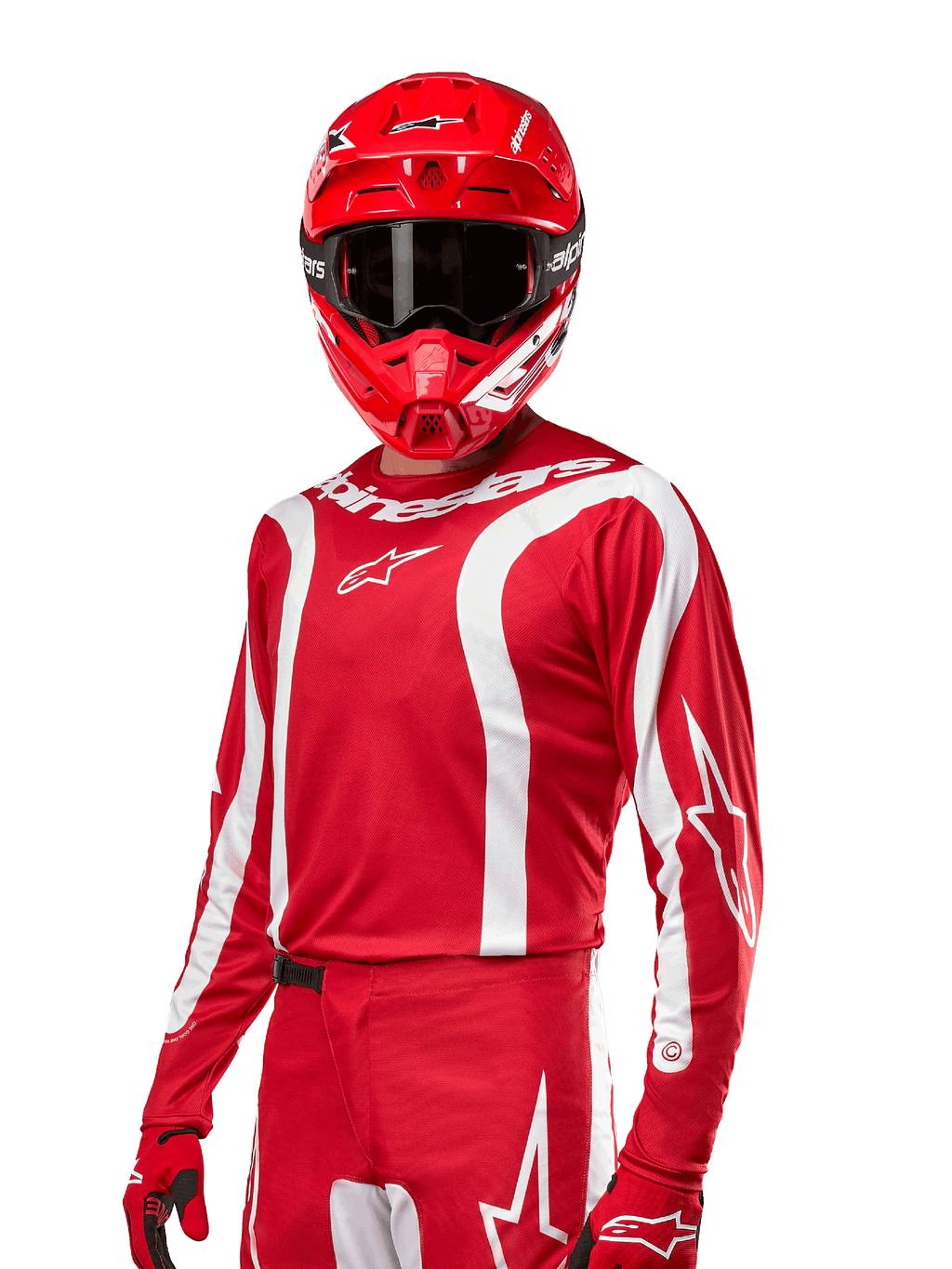 Alpinestars 2024 Fluid Lurv Jersey, koszulka motocrossowa, czerwono-biała, noszona z dopasowanym czerwonym kaskiem i rękawicami, sportowy design z białymi zakrzywionymi pasami i logo Alpinestars