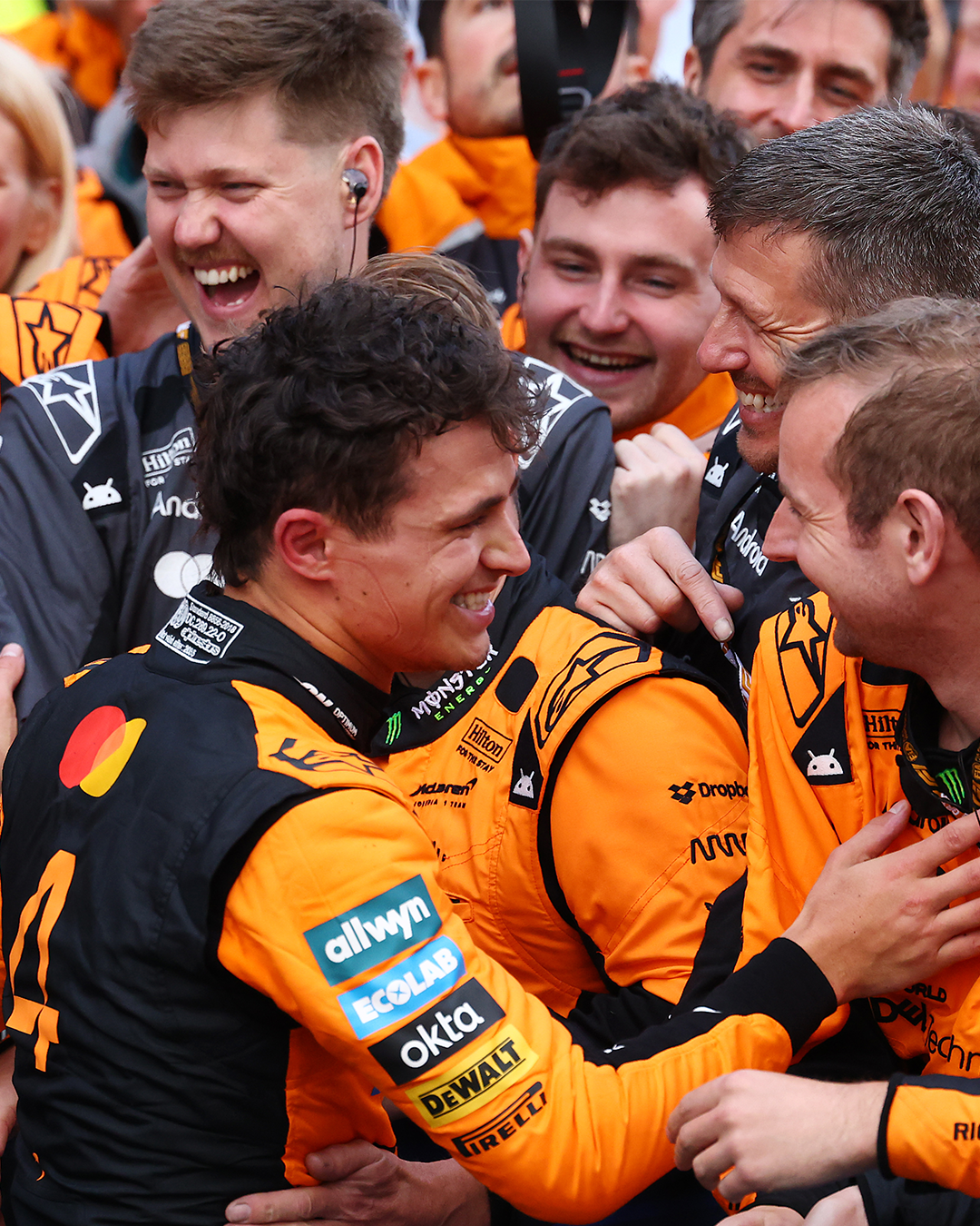 Lando Norris celebrating a victory with the team