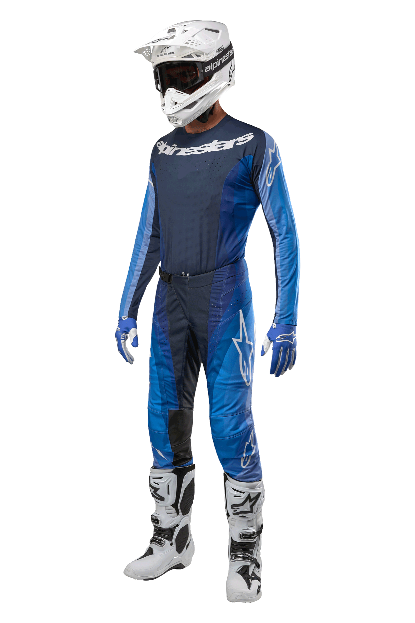 Alpinestars 2024 Techstar Pneuma Pants, spodnie motocrossowe, ciemnogranatowe i jasnoniebieskie, pełny zestaw wyścigowy z dopasowaną koszulką, biały kask z goglami, niebiesko-białe rękawice i białe buty, profesjonalny zestaw odzieży terenowej