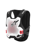 Alpinestars Tech-Air® MX System, autonomiczna kamizelka z poduszką powietrzną off-road, biało-czarna, perforowany biały ochraniacz klatki piersiowej z czarnym logo, czerwone klamry boczne, czarna konstrukcja z elastycznej siatki, zaawansowana ochrona do motocrossu i supercrossu