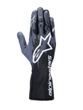 Rękawice Alpinestars Tech-1 K V3, rękawice kartingowe, Black Anthracite, z dużym białym logo Astar na wierzchu dłoni, ciemnoszarym wzorem w stylu kamuflażu i mankietem z pionowym białym brandingiem Alpinestars