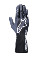 Rękawice Alpinestars Tech-1 K V3, rękawice kartingowe, Black Anthracite, z dużym białym logo Astar na wierzchu dłoni, ciemnoszarym wzorem w stylu kamuflażu i mankietem z pionowym białym brandingiem Alpinestars