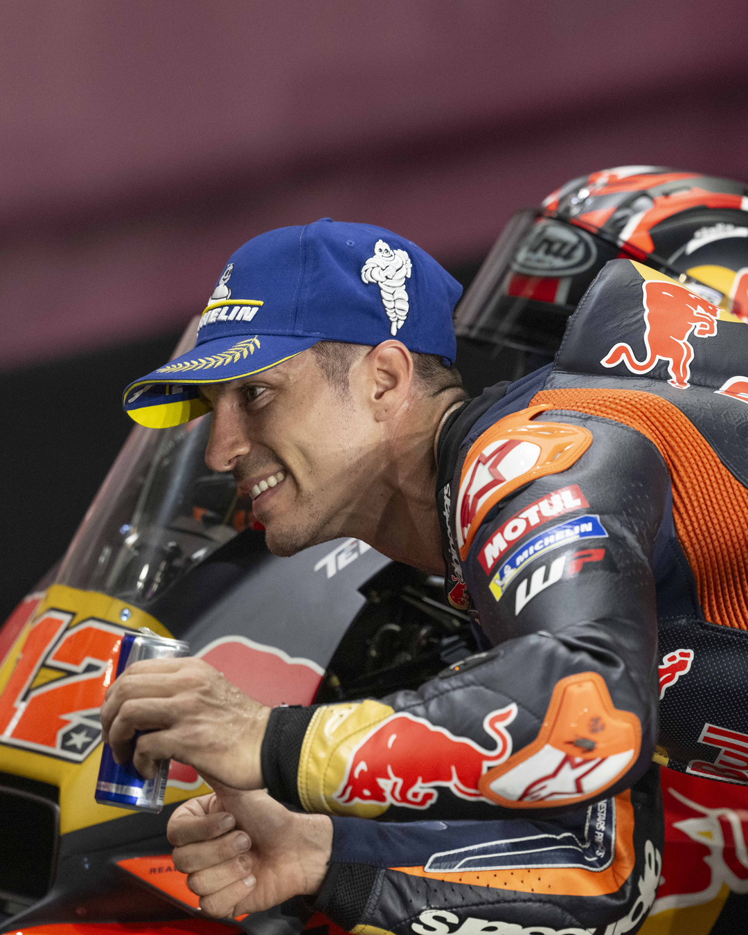 Vinales wearing Alpinestars suit and drinking a RedBull