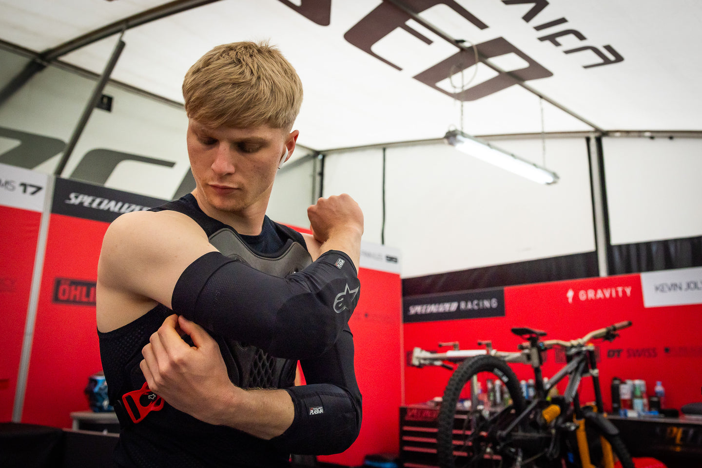 Jordan Williams wearing Alpinestars Plasma MTB protections in the paddock before a race