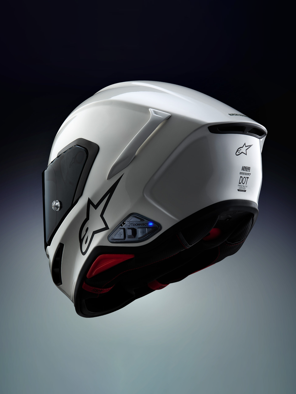 Alpinestars A-Connect system komunikacji zainstalowany na kasku motocyklowym Alpinestars S-R7, biały i czarny, z interkomem Mesh 3.0, Bluetooth 5.3 i aktywną niebieską diodą LED