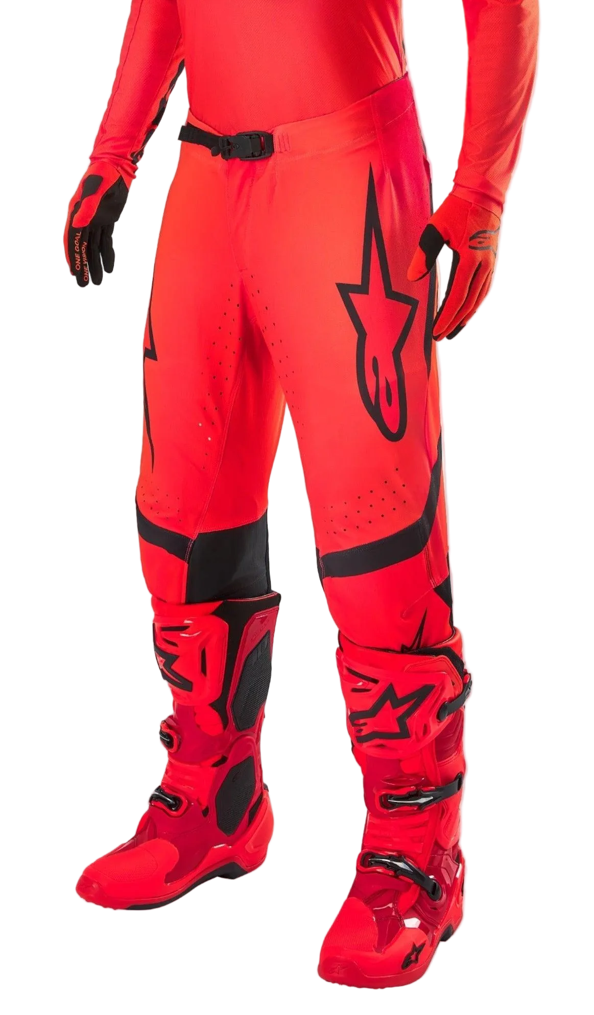 Alpinestars Supertech Ember LE Motocross Pants, Red Fluo and Bright Red with Black accents, worn with matching red racing boots and gloves, featuring a prominent black star logo on the leg, secure waist buckle, and perforated zones for ventilation.