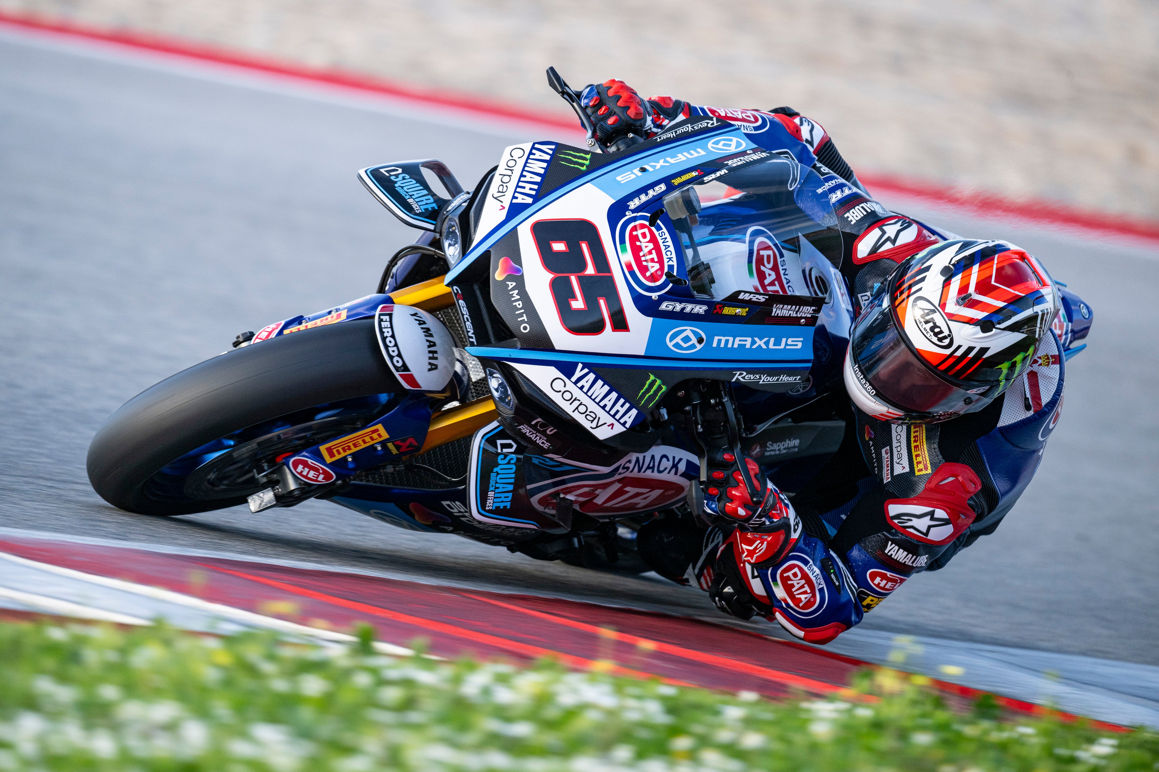 Jonathan Rea in Alpinestars racing gear on a Yamaha bike on a race track