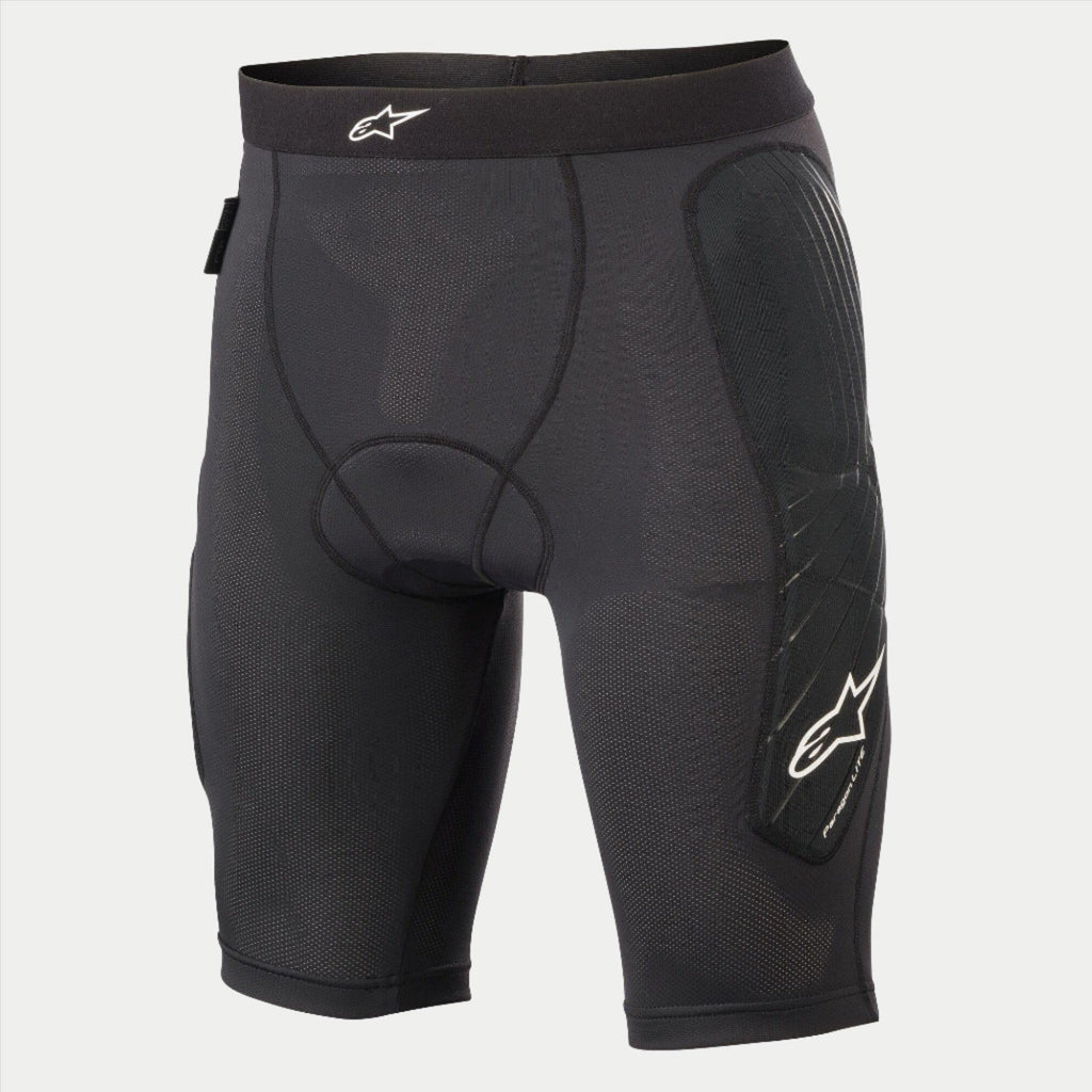Alpinestars Youth Paragon Lite Protection Short, rowerowe spodenki ochronne, czarne, oddychająca siateczka, zintegrowane ochraniacze bioder, białe logo Alpinestars na pasie i boku nogawki, lekkie ochronne spodenki wewnętrzne do MTB