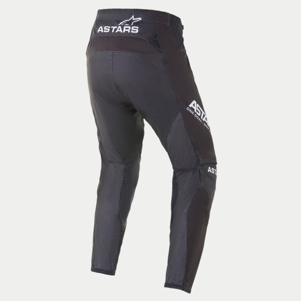 Spodnie Alpinestars Techstar Phantom 2021, spodnie motocrossowe, czarno-białe, widok z tyłu z białym logo ASTARS na pasie i boku uda, grafitowe panele z teksturowanej siatki na nogawkach, sportowy krój wyścigowy